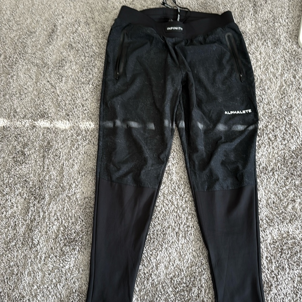 Alphalete athletics mens infinity tech pant size L green forest Christian Guzman